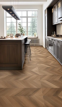Herringbone wood flooring in a kitchen with arched windows