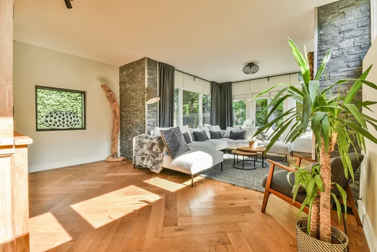 Cozy apartment living room with patterned wood flooring