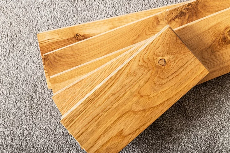 Hardwood floor mid-renovation with old boards being lifted