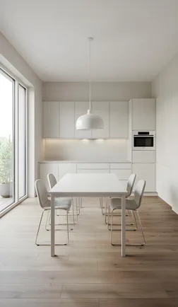 Bright minimalist kitchen and dining area with light wood-look flooring