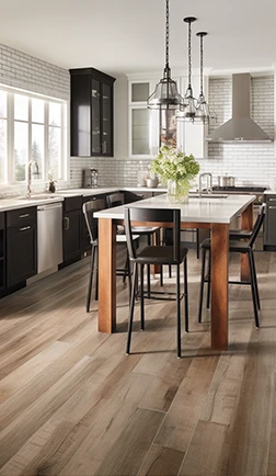 Wide-plank hardwood flooring in a modern kitchen with an island