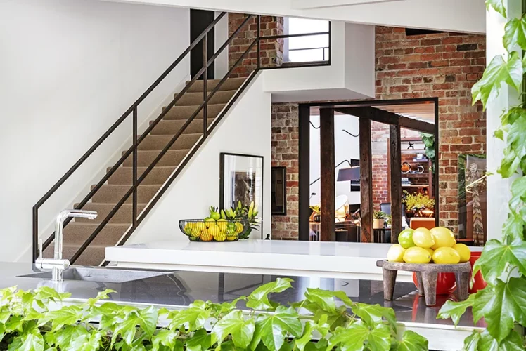 Hardwood staircase with a fitted wooden handrail